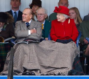Prince-Philip-snuggled-under-blanket-Queen-Elizabeth-II